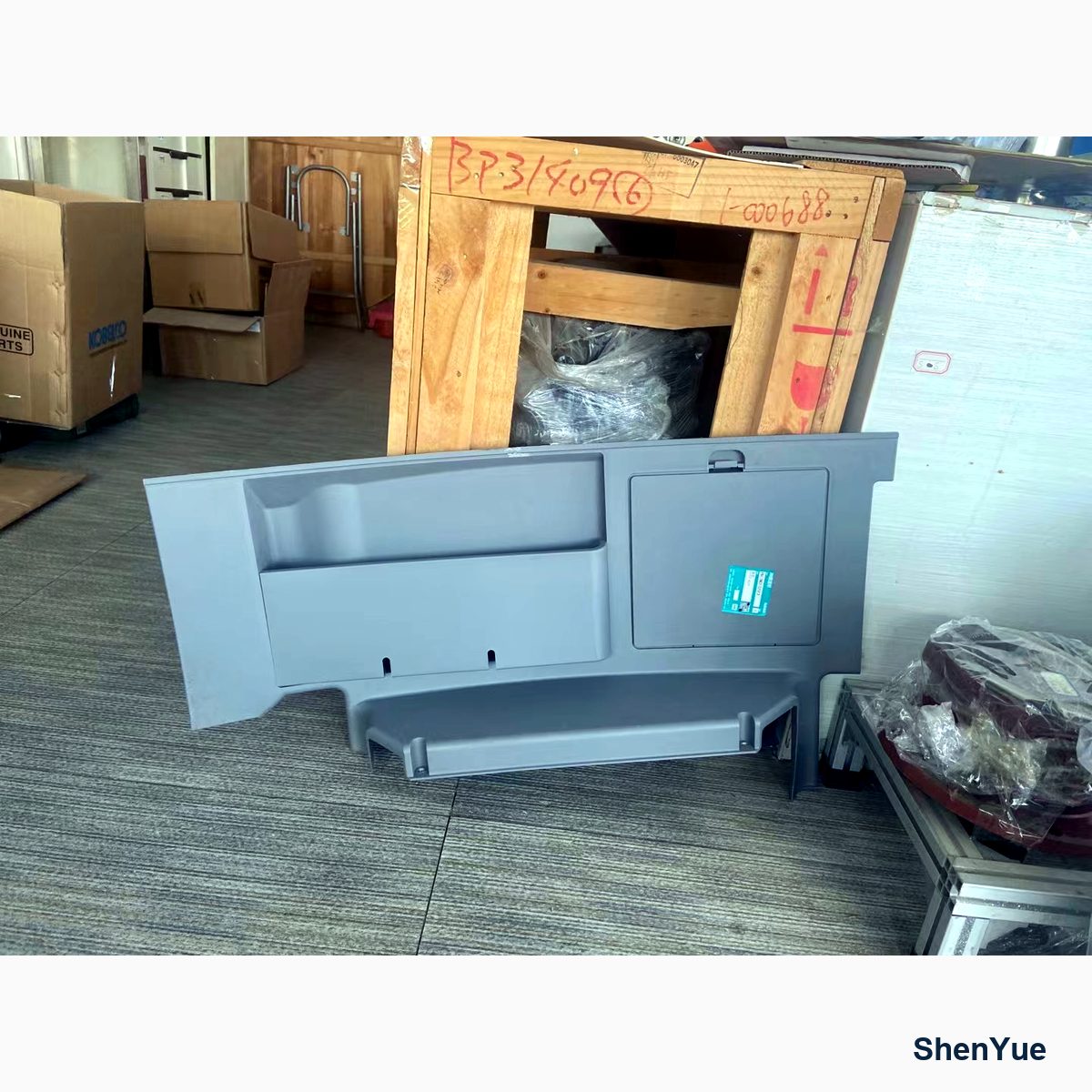 Cover of Seat YN17M01325F2 Kobelco part — real photo from our Guangzhou warehouse